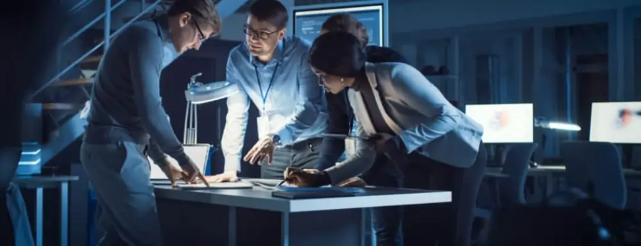 Technical team reviewing plans