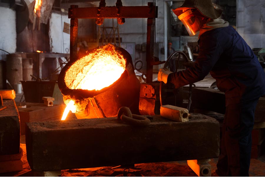 Molten metal being poured in a foundry